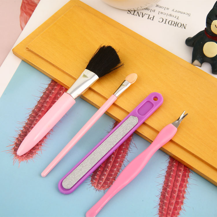 New 4-piece set of beauty, manicure and grooming tools: makeup brush + eyeshadow stick + nail file + dead skin scraper set details Picture