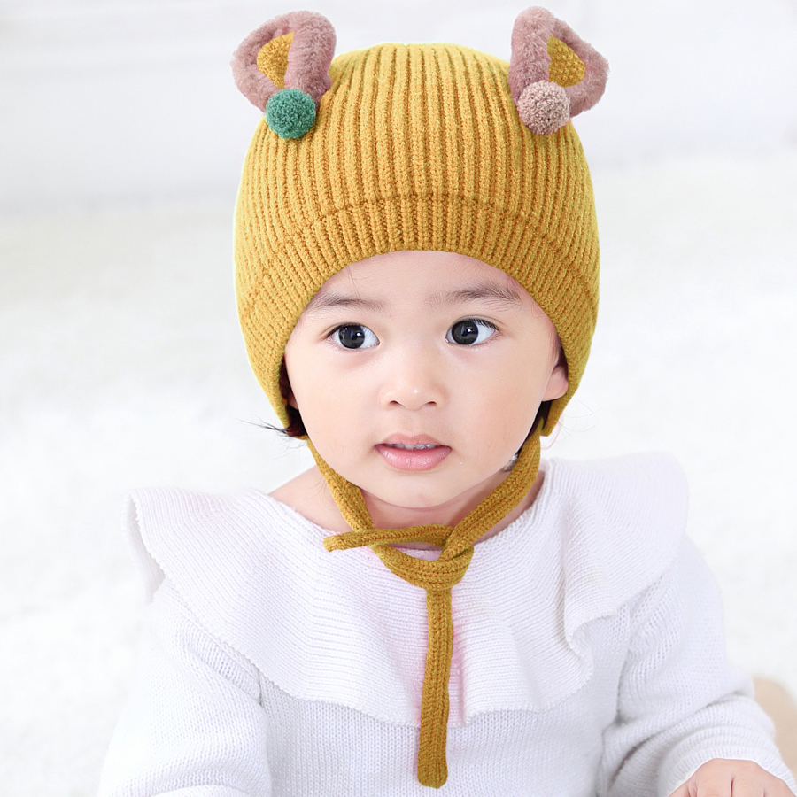 Baby wearing Korean Style Hat in Cold Weather