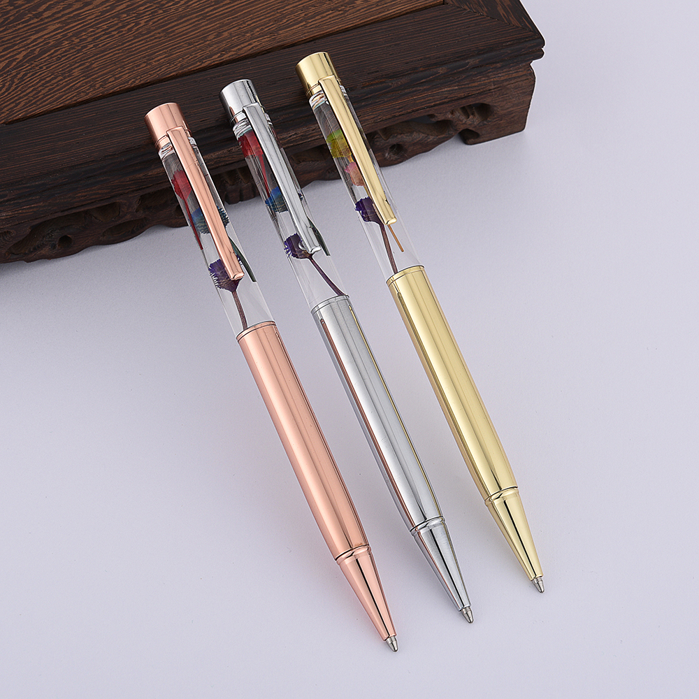 Factory direct sales of metal flower pens, creative oil-filled dry flower pens, rose gold gift pens in stock for wholesale