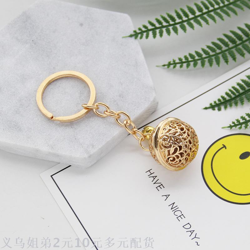 Simple hollowed-out metal bell key chain, the same style keychain as the flower of a thousand bones, palace bell couple pendant, small gift Item Picture