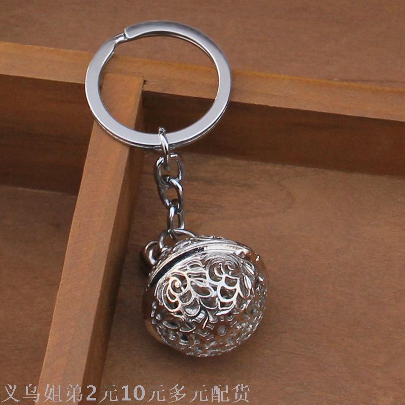 Simple hollowed-out metal bell key chain, the same style keychain as the flower of a thousand bones, palace bell couple pendant, small gift Application Scenario