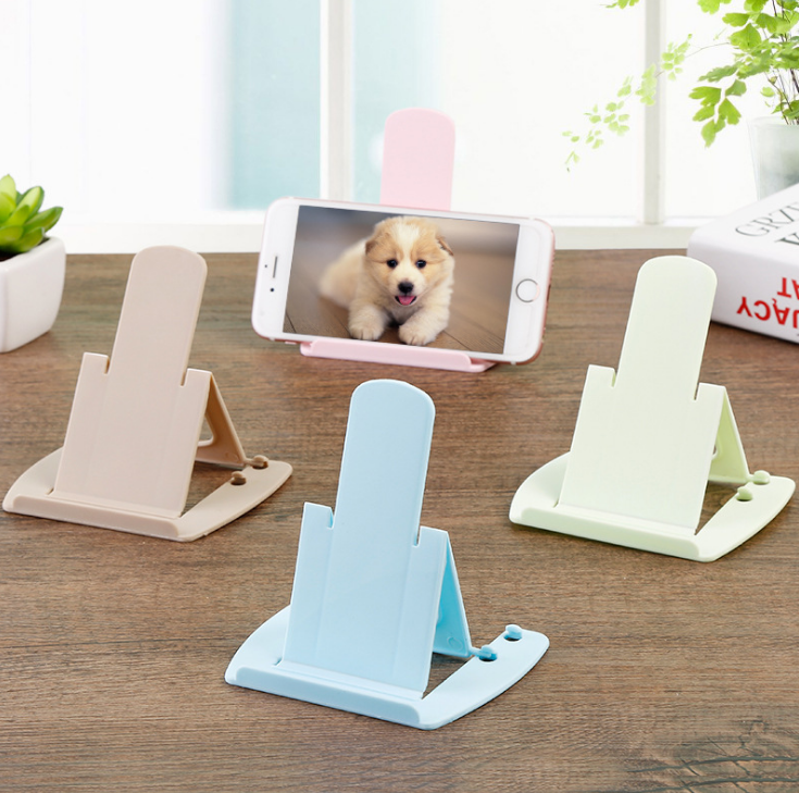 Card-type mobile phone stand, foldable with two adjustable inclinations, portable plastic mobile phone stand wholesale