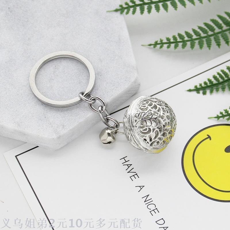 Simple hollowed-out metal bell key chain, the same style keychain as the flower of a thousand bones, palace bell couple pendant, small gift Specification image