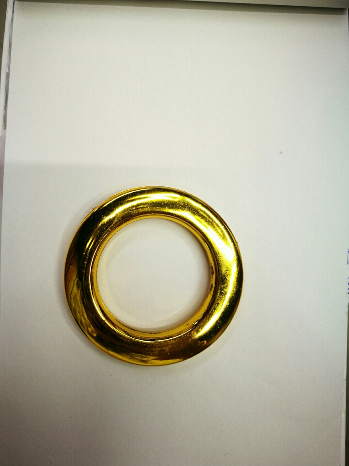 The plastic ring of the curtain accessory is gold