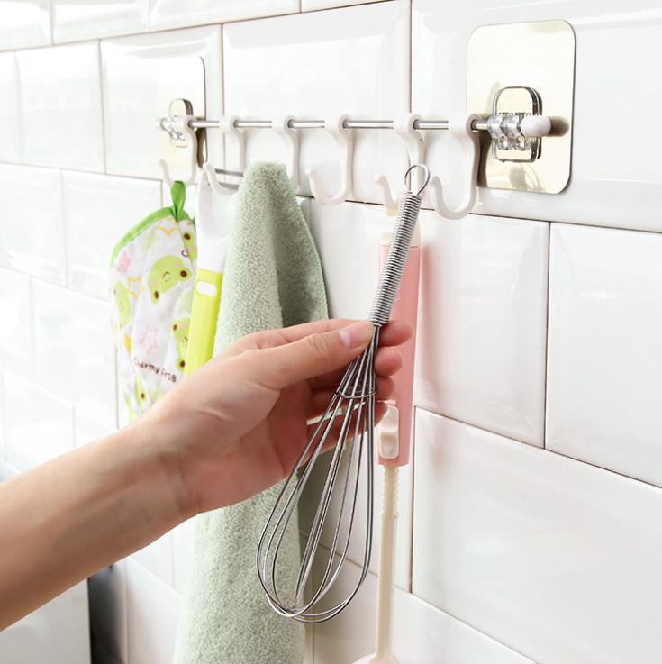 Non-punching strong adhesive coat hooks, clothes hooks, kitchen row hooks, bathroom towel hooks, coat and hat racks Application Scenario