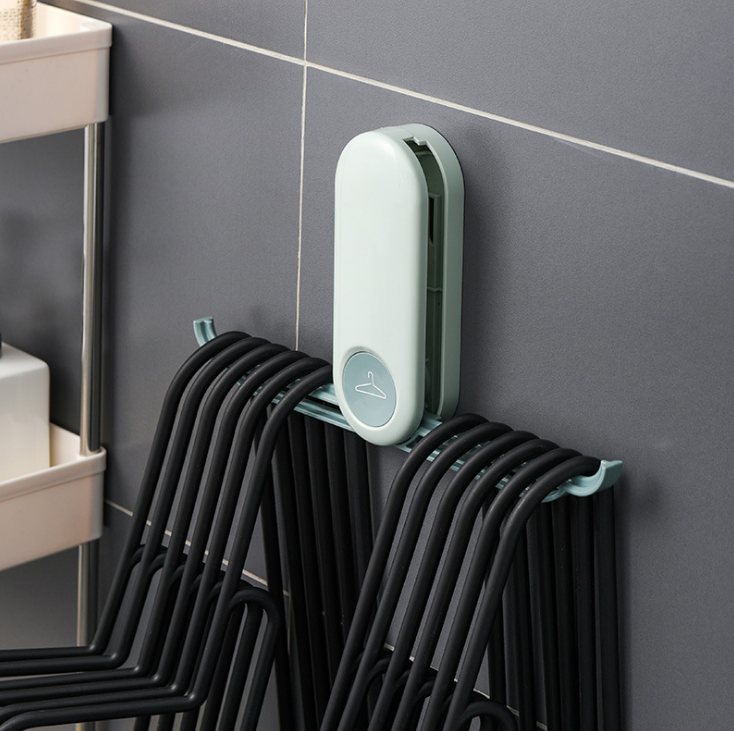 Nordic wall-mounted clothes hanger storage rack, clothes drying rack organization rack, household folding, no-drilling, pasted clothes hanger storage rack Specification image
