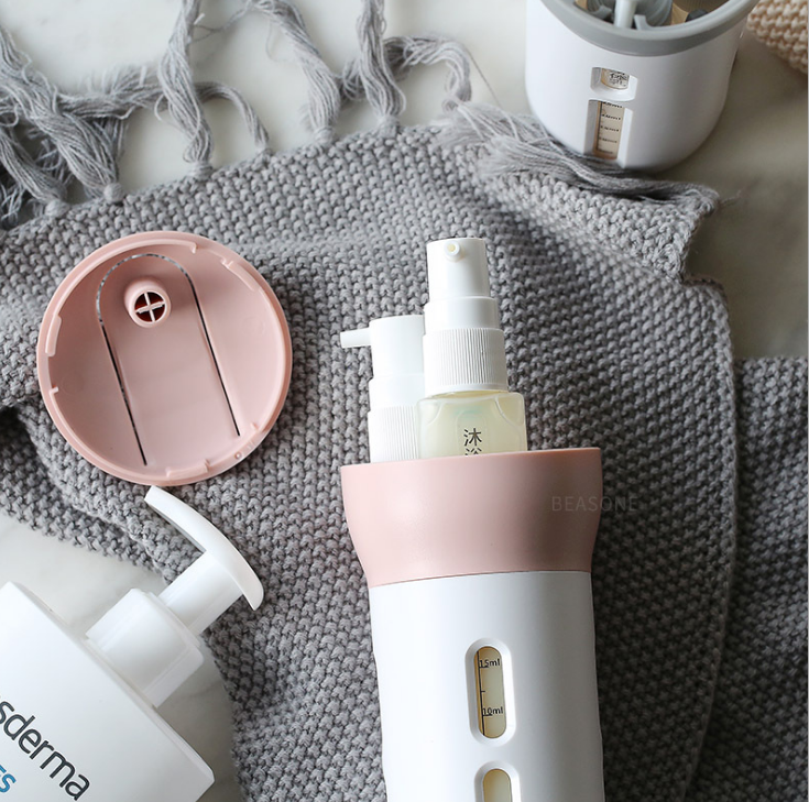 抖音爆款旅行乳液分装瓶出差化妆品分装瓶便携四合一旋转按压式产品图
