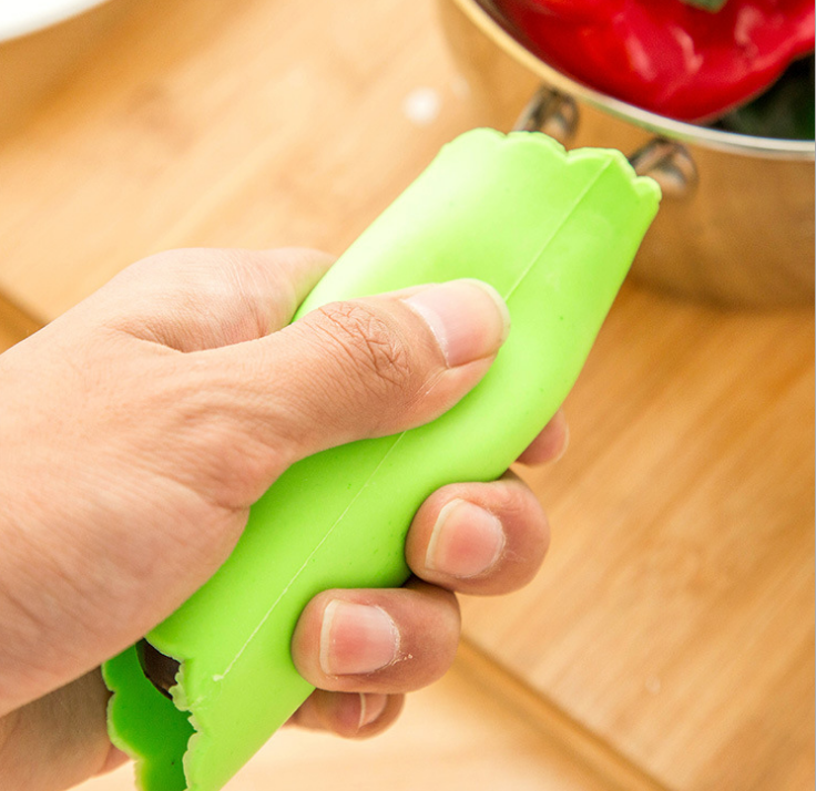 Kitchen helpers: Garlic peelers, garlic strippers, garlic peelers, garlic purees, and wholesale garlic peelers details Picture