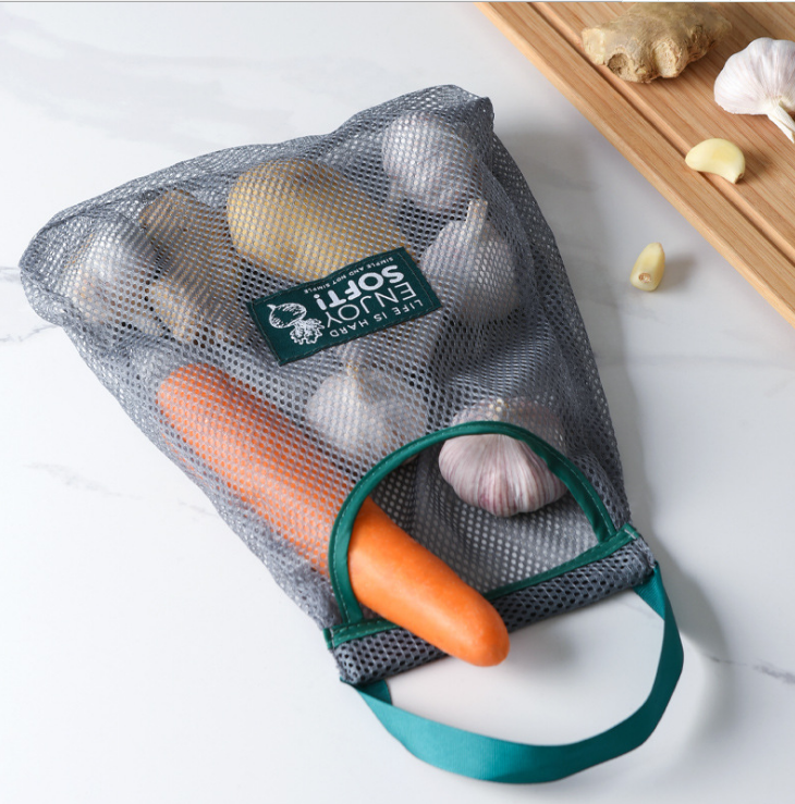 Kitchen vegetable storage net bags, household multi-purpose creative fruit wall-mounted bags, hanging onion and garlic storage bags Application Scenario
