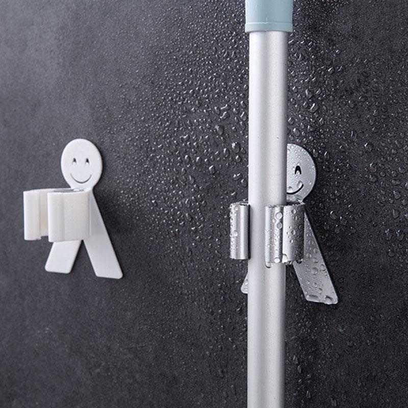 Cartoon doll smiling face mop hook without drilling, bathroom mop rack, storage rack, mop clamp hanging rack Application Scenario