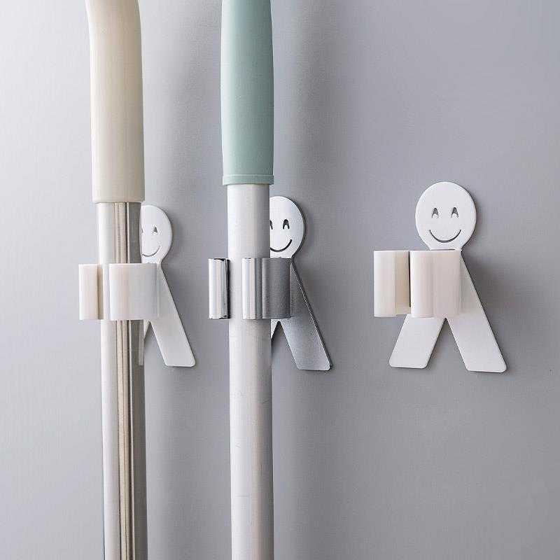 Cartoon doll smiling face mop hook without drilling, bathroom mop rack, storage rack, mop clamp hanging rack