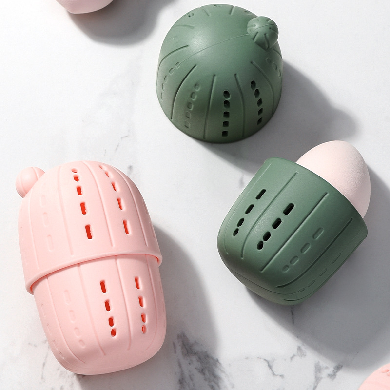 A shelf for storing beauty eggs, makeup balls, makeup powder puffs, an Ins-style cactus, and silicone storage