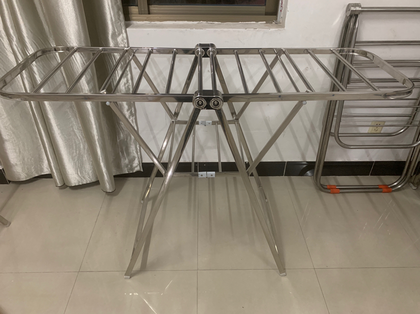 Folding clothes drying rack, full figure