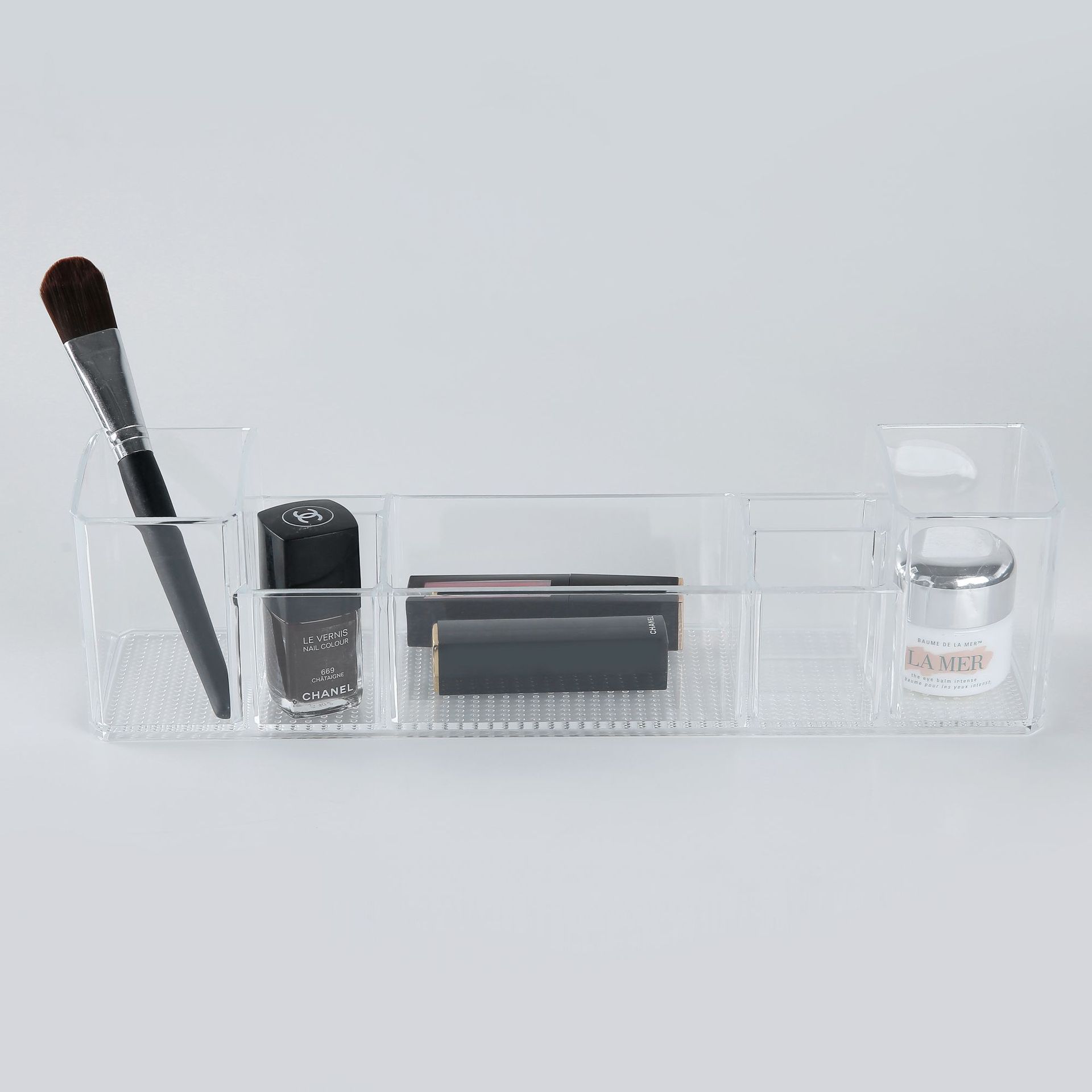 Qiaofeng multi-compartment cosmetics storage box, Office desktop sundries remote control organization storage box, plastic storage box. Application Scenario