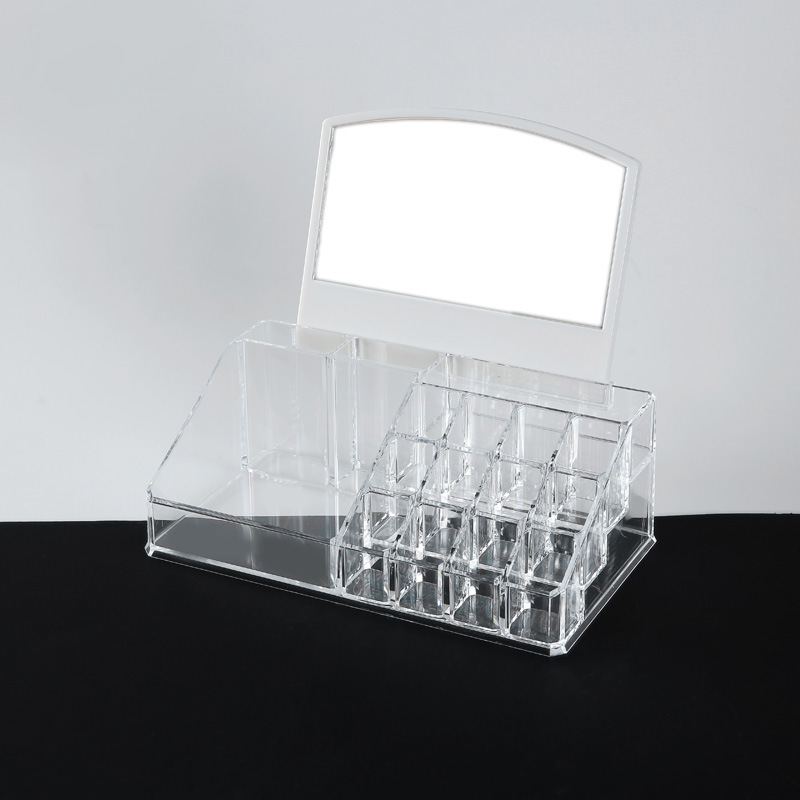 A transparent flat box with a make-up mirror on the top of the desk.