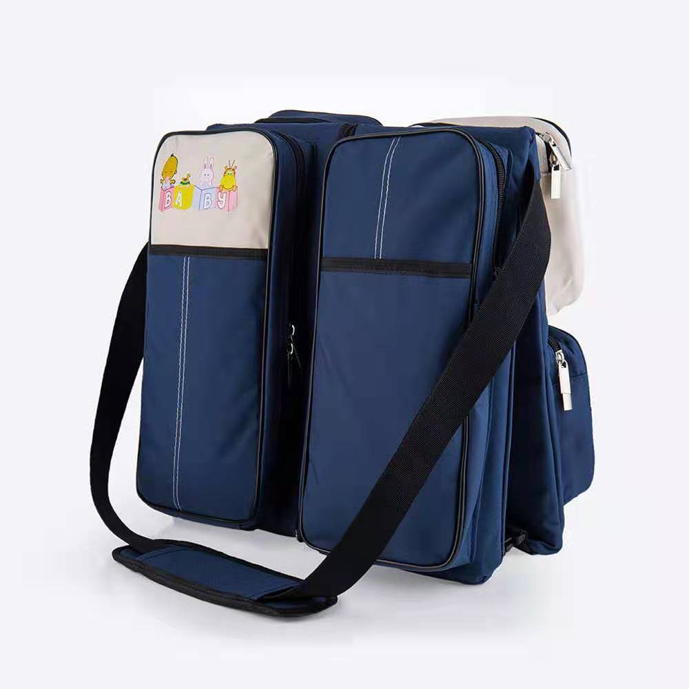 【厂家热销】便携式婴儿床 旅行可折叠带蚊帐宝宝床多功能妈咪包白底实物图