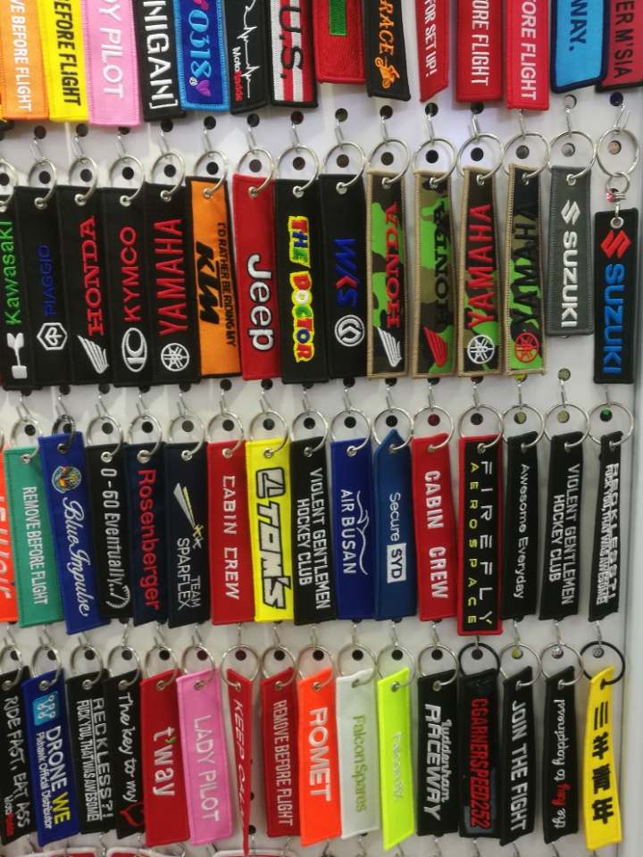 Double-sided embroidered logo keychain pendant for motorcycles, motorcycles and racing cars Application Scenario