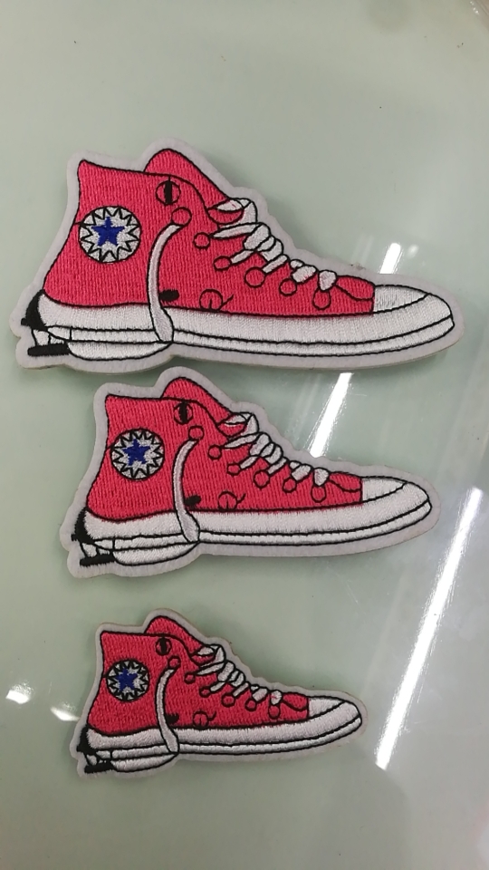 There are 12 pieces of paper cards each with embroidered fabric patches Item Picture