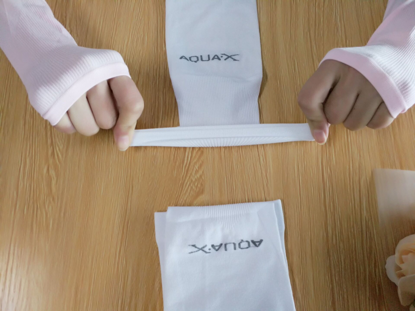 韩版夏季冰袖防晒袖套跑男骑行手套户外薄款冰丝冰袖女白底实物图