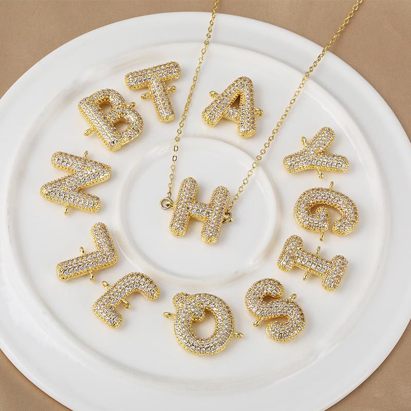 Honglu Cross-border's new 26-letter English letter pendant necklace accessory, a fashionable copper-plated and zircon pendant accessory Application Scenario
