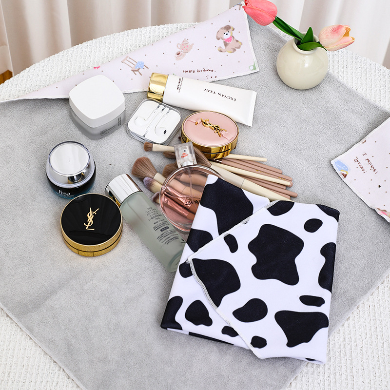 百粘布化妆品相机平板收纳包百折不变形狂甩不掉奶牛纹懒人收纳袋产品图