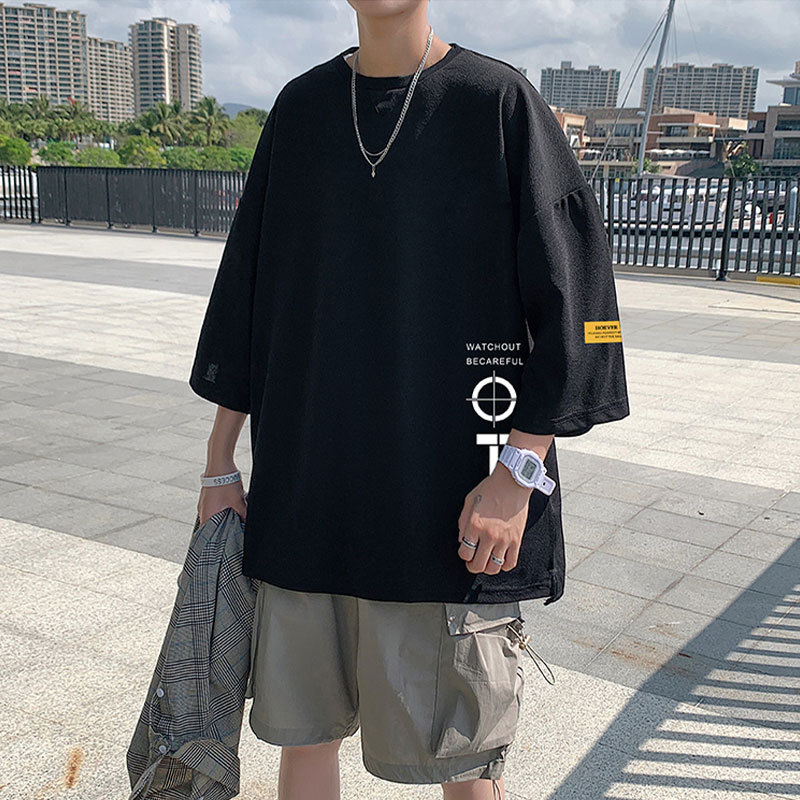 Summer trend: Three-quarter sleeve men's loose short-sleeved T-shirt with Korean-style loose short-sleeved tops for overweight and plus-size people. Five-quarter mid-sleeved top details Picture