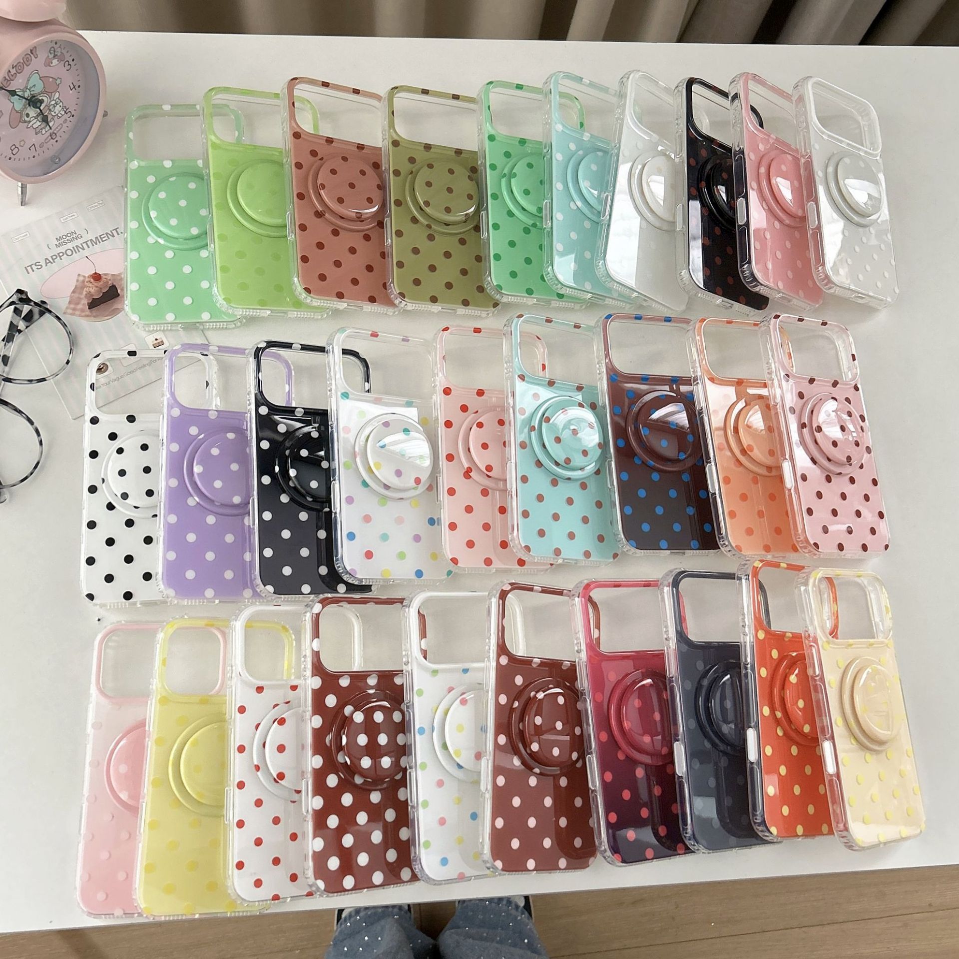 A fresh and light polka dot phone case for iPhone17pro and Apple 16promax, with a 15p magnetic stand protective cover
