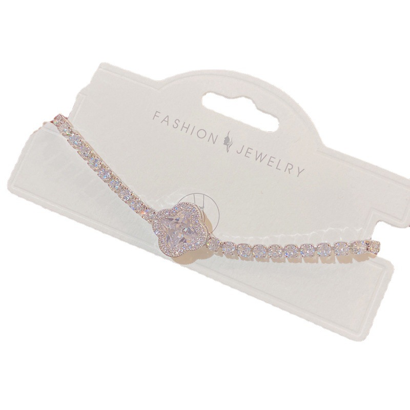 The 2023 summer new micro-inlaid zirconium four-leaf flower bracelet is a unique, luxurious and elegant adjustable jewelry item for female Internet celebrities Item Picture