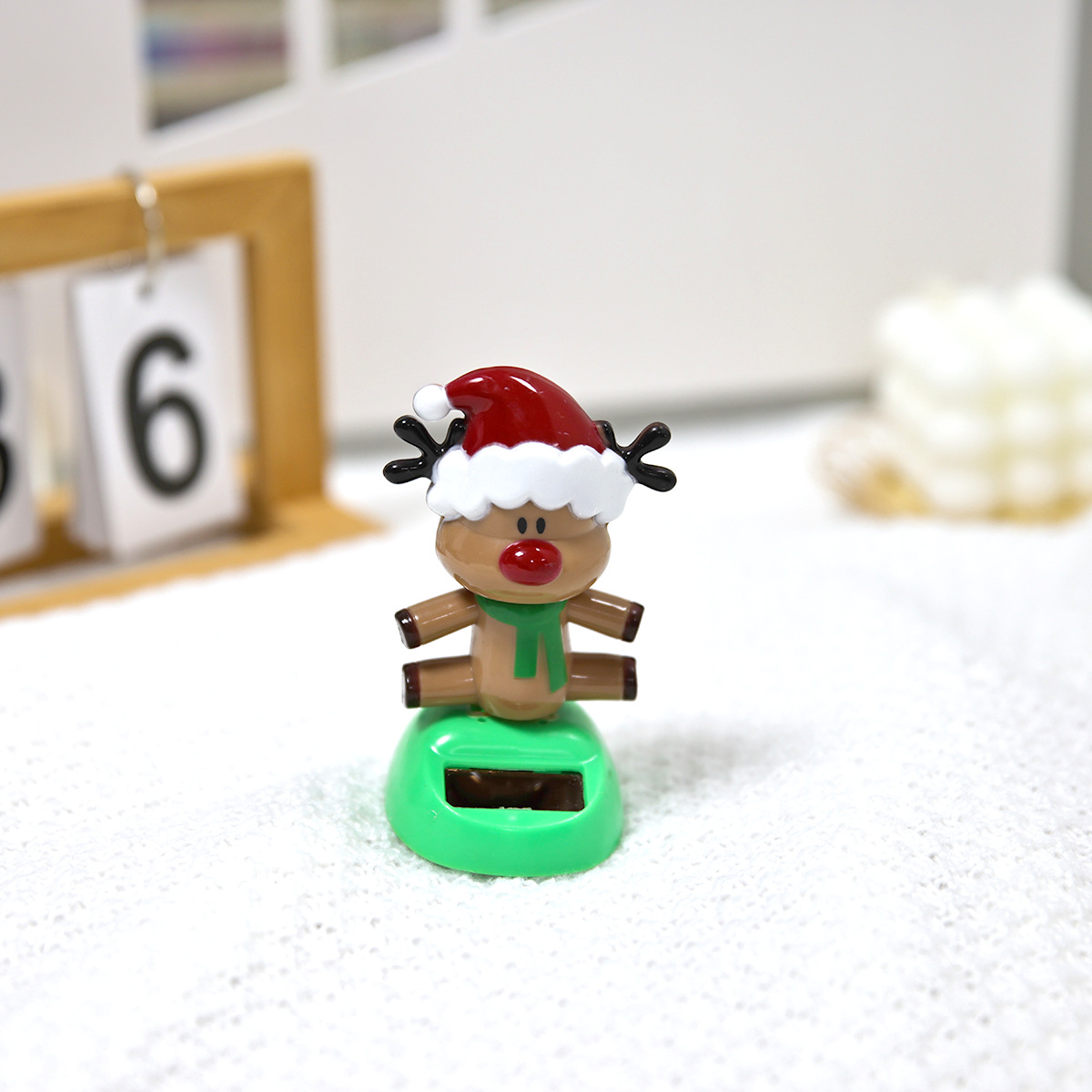 Cross-border new product creative solar-powered automatic rocker Christmas holiday deer man car accessory is available for wholesale Item Picture