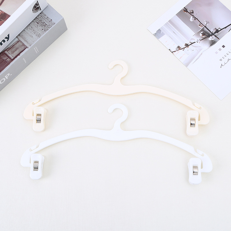Wholesale of simple Japanese-style anti-slip trouser racks, plastic trouser hanging clips, traceless clothes hangers, and household underwear stretch clips details Picture