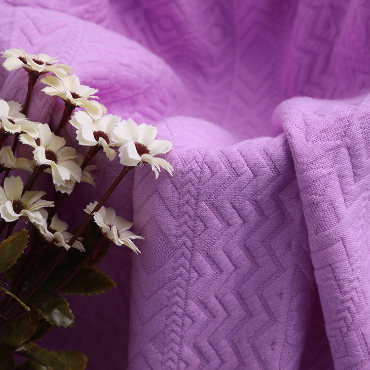 The manufacturer supplies tr knitted jacquard fabric 32s cotton-like polyester yarn weft knitted dyed fabric for children's clothing and fashion