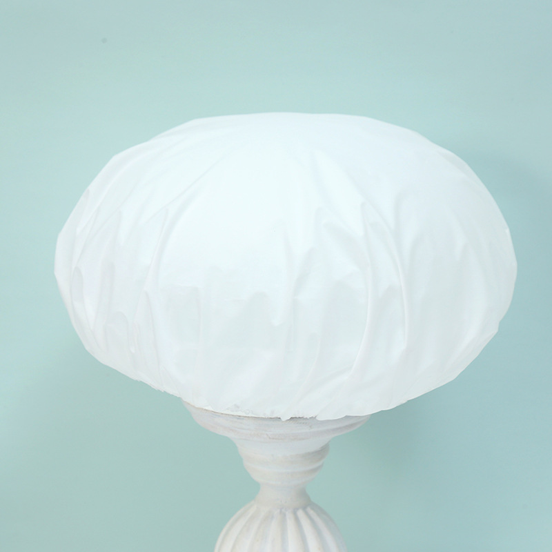 The thickened disposable shower cap is reusable, waterproof, transparent for adults, and features a high-end printable waterproof upgrade for hotels Specification image