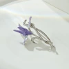 The elegant purple enamel iris flower brooch exudes a fashionable and versatile charm. It is a new oil-drip flower brooch for women Application Scenario