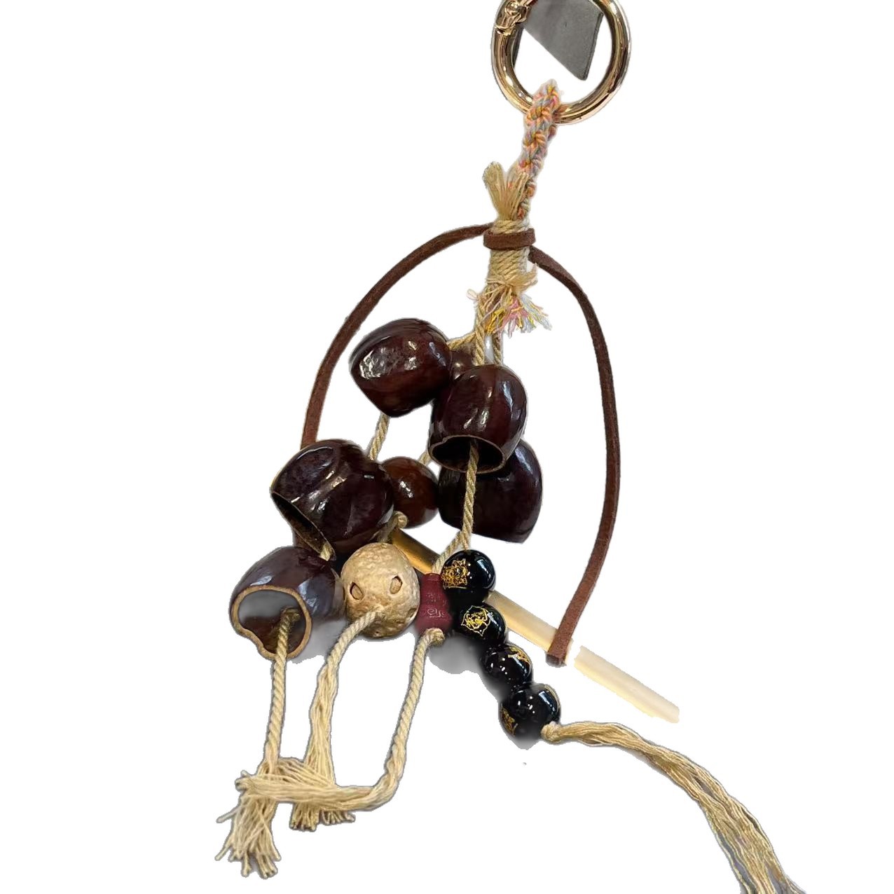The new Indonesian black fruit wind chime pendant is paired with a black agate gilded bag for hanging cars, mobile phones and couples Item Picture
