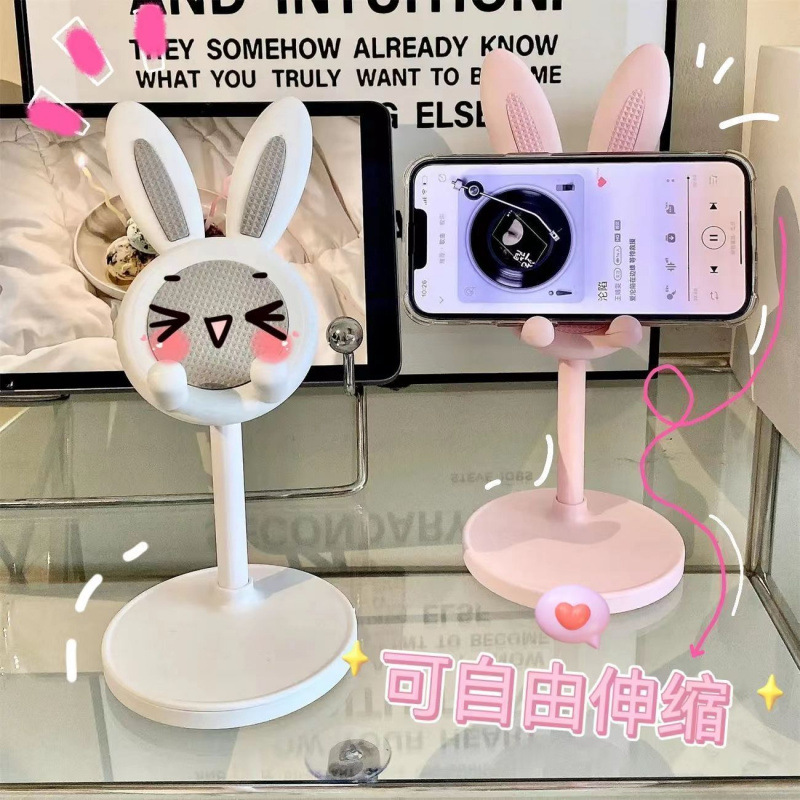 The little Rabbit mobile phone stand is a desktop adjustable and lift-up support stand for lazy selfies and live streaming. It is a cute cartoon support stand Application Scenario