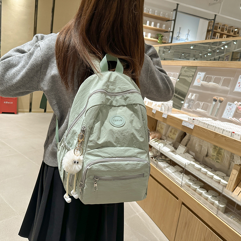College student schoolbag, lightweight backpack for girls, simple solid color backpack, ultra-light backpack for girls' spring outing in junior and senior high school