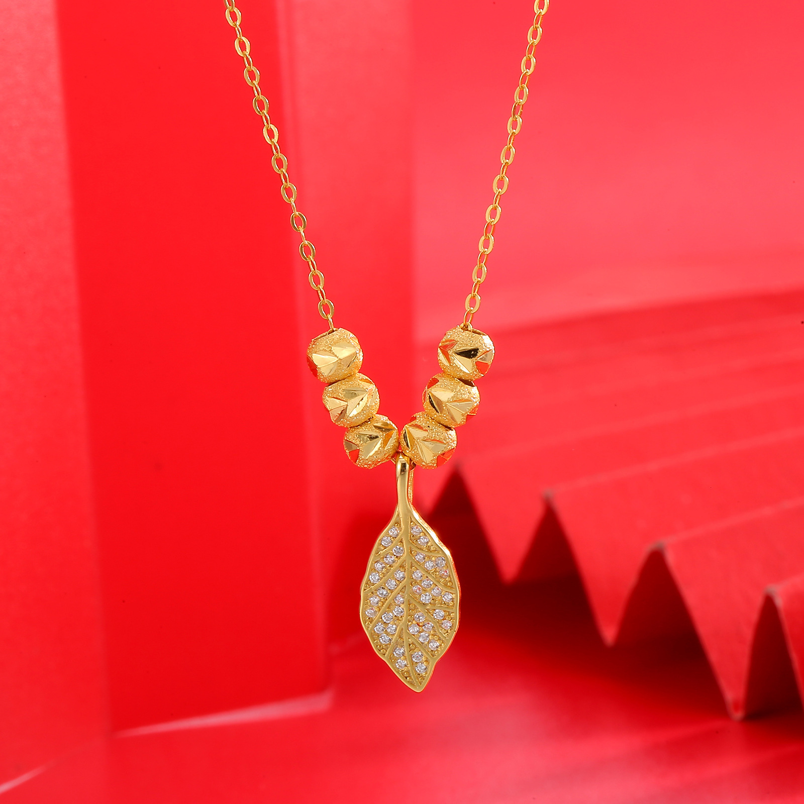 S925 sterling silver slightly inlaid with diamonds, Golden branch and jade leaf pendant necklace, a niche, light luxury and high-end look for women, wholesale from the manufacturer full figure