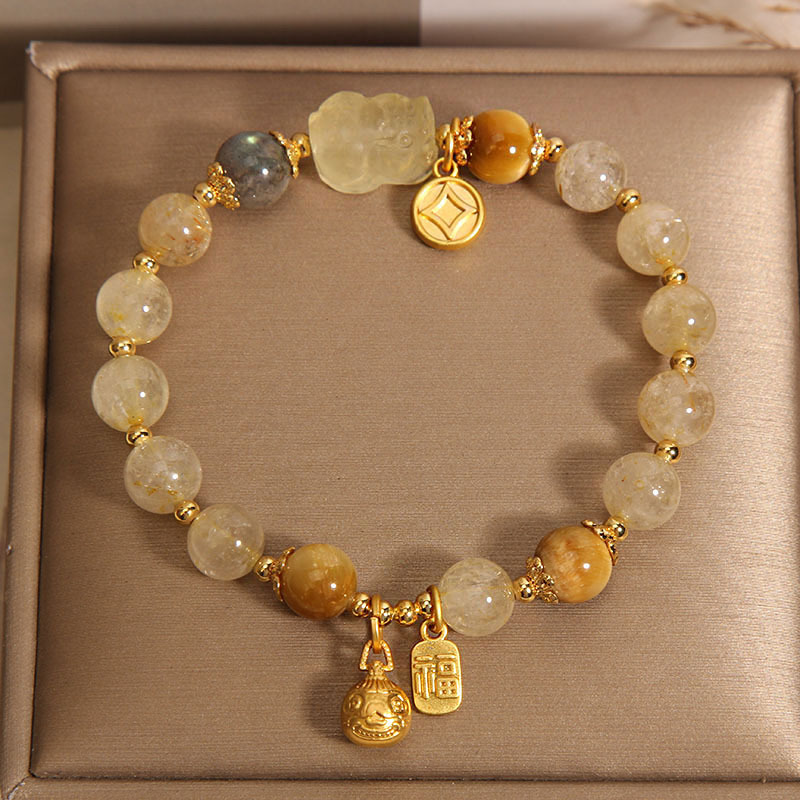 Natural gold rutile crystal moonstone bracelet, female gold-swallowing beast yellow tiger's eye yellow rutile bracelet for your girlfriend and best friend details Picture