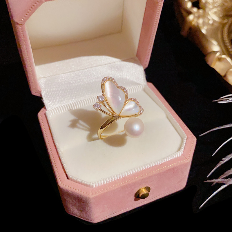 A sweet and fresh index finger ring with a unique and unique design of mother-of-pearl butterfly and pearl in Japanese and Korean fashion Specification image