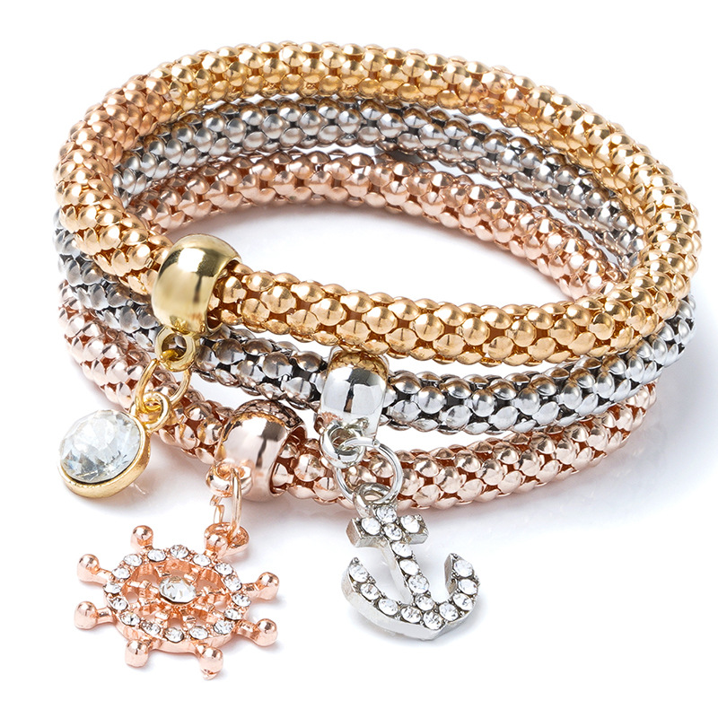 A cross-border best-selling alloy three-color set of elastic popcorn corn chain with diamond heart pendant bracelet for women from Europe and America details Picture