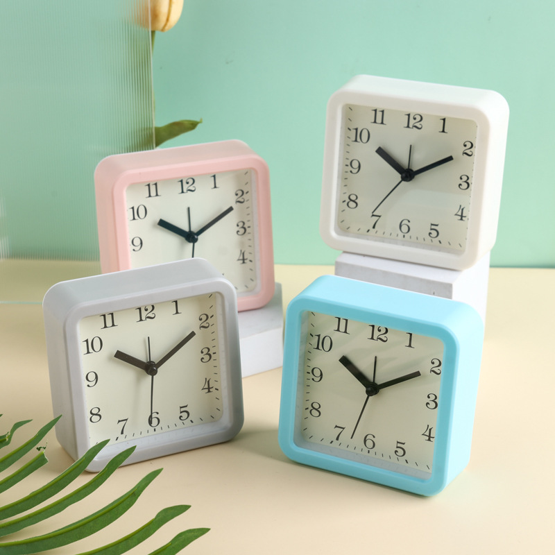 Creative four-way simple alarm clock, cartoon quartz multi-functional plastic digital bedroom desktop alarm clock