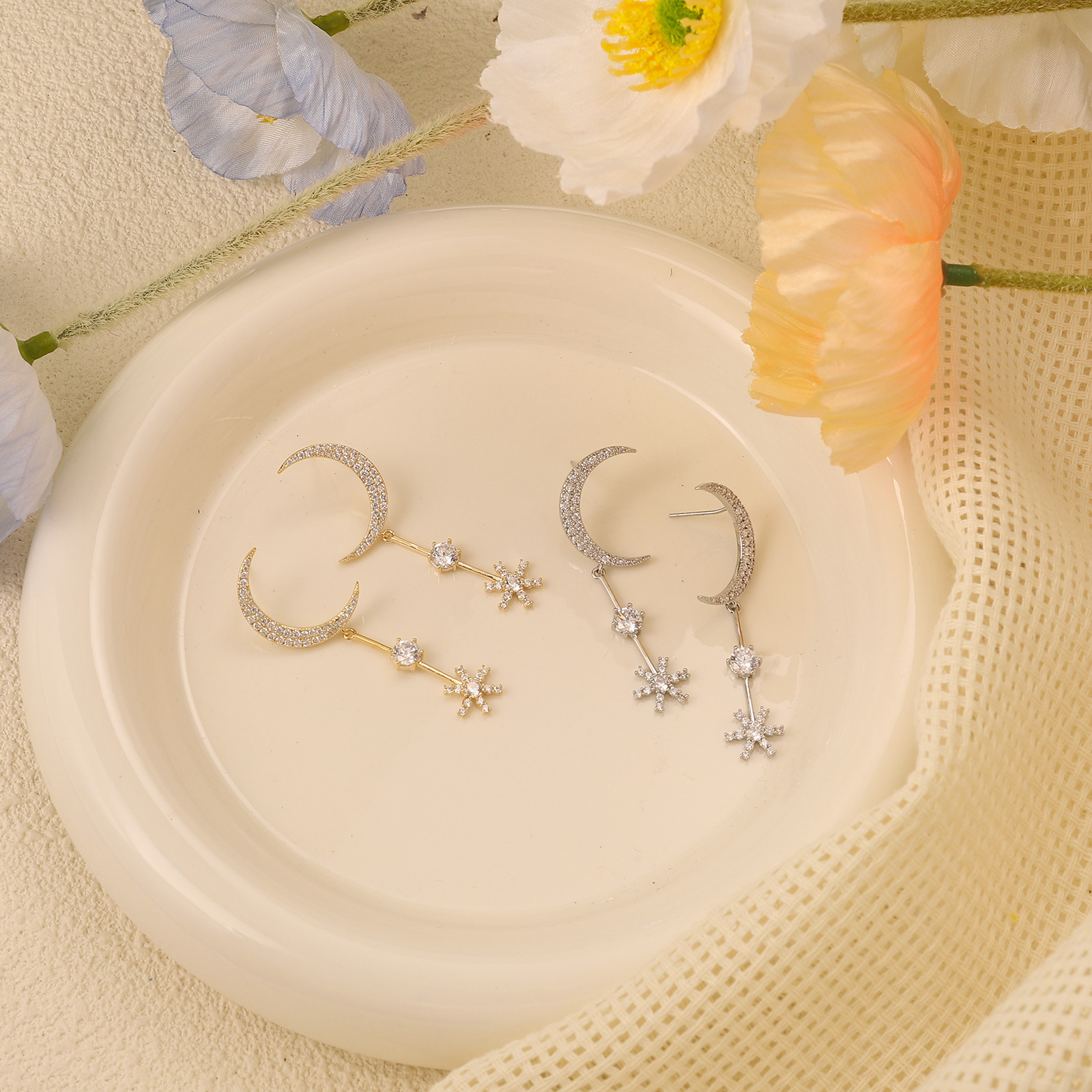 "Flowing Zircon earrings, Instagram influencer style Moon and Star earrings, S925 silver needle 14K gold high-quality earrings wholesale. Application Scenario