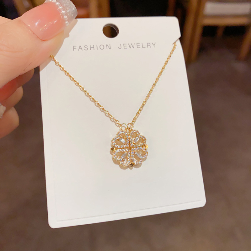 Four-leaf flower magnetic heart-shaped necklace for women, light luxury, fashionable and individual sweater chain, high-end and versatile collarbone chain accessory