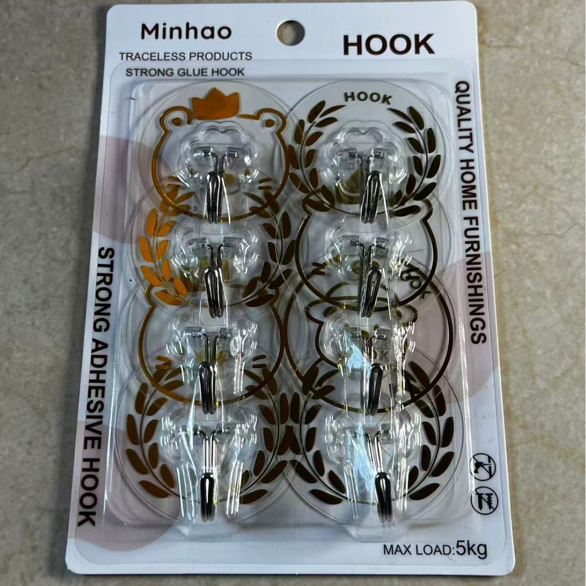 Transparent plum blossom sheet adhesive hook, coat and hat adhesive hook, seamless adhesive hook, kitchen and bathroom non-drilling hook, wall hook Application Scenario