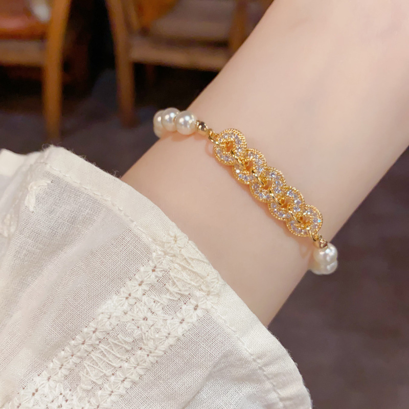 Nuevo China circonitas de cobre dinero perlas pulsera de perlas ligero lujo alto sentido de la cadena de mano temperamento versátil moda mano accesorios al por mayor Specification image
