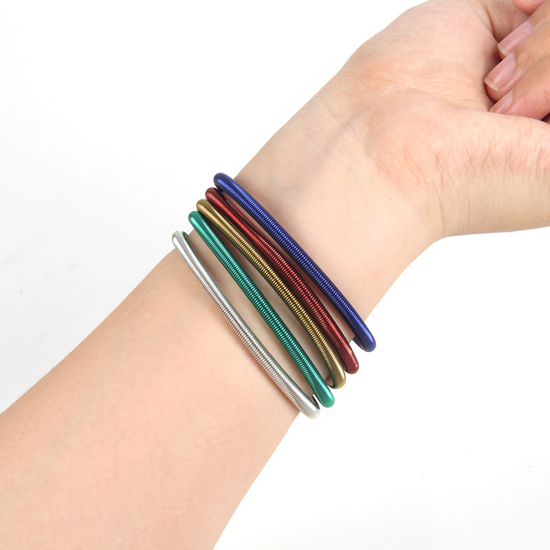 Cross-border elastic pressure steel ring bracelet toy wholesale decoration activity meridian silver wrist massage spring bracelet details Picture