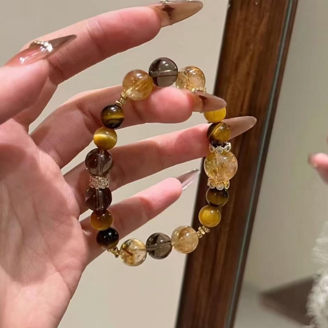 Jinba Da Comprehensive natural yellow tower Crystal Golden Tiger Eye Yellow crystal original Design bracelet Tea crystal White Crystal bracelet Specification image