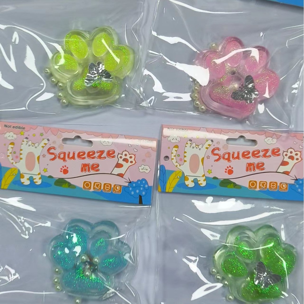 工厂直销TPR软胶透明金粉带灯中号猫爪猫掌萌宠团子卡通减压玩具细节图