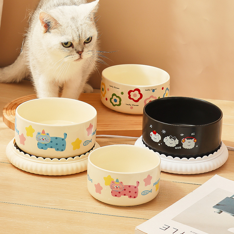 Ceramic winter heating constant-temperature drinking water dispenser, cat bowl, anti-tipping and non-black chin yogurt maker, pet cat food bowl