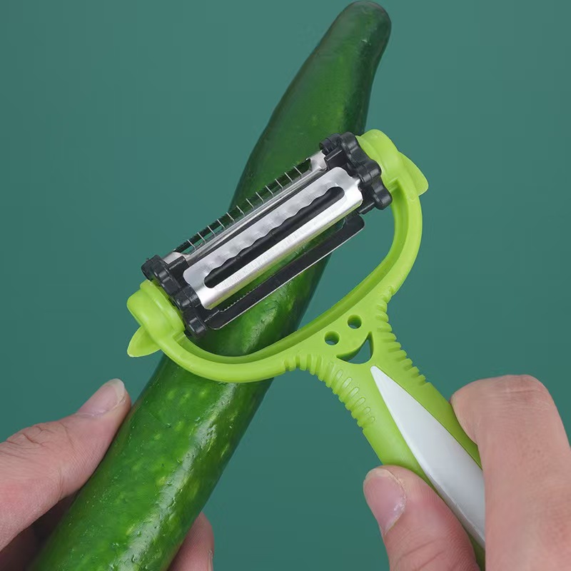 Smiling face peeler, a small kitchen peeler, a three-in-one multi-purpose fruit and vegetable peeler, slicing and peeler details Picture